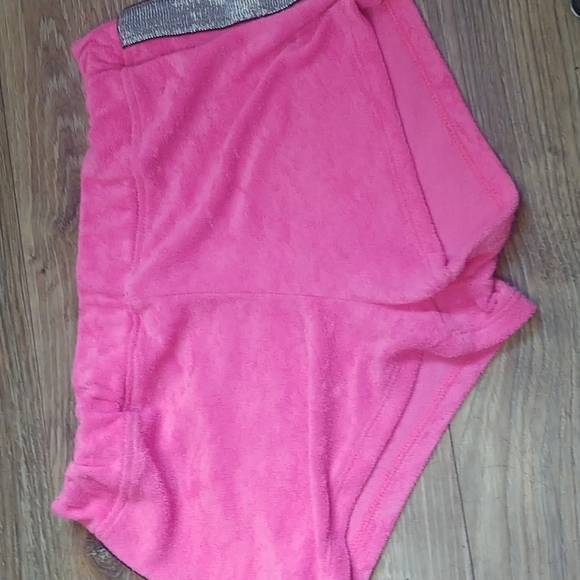 A one piece pink bathing suit, matching pink booty shorts! - Picture 2 of 5